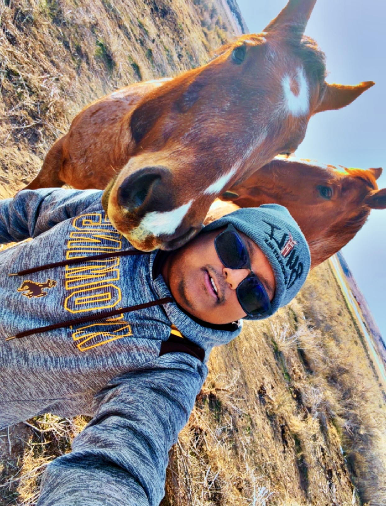 Win with horses in the Wyoming countryside